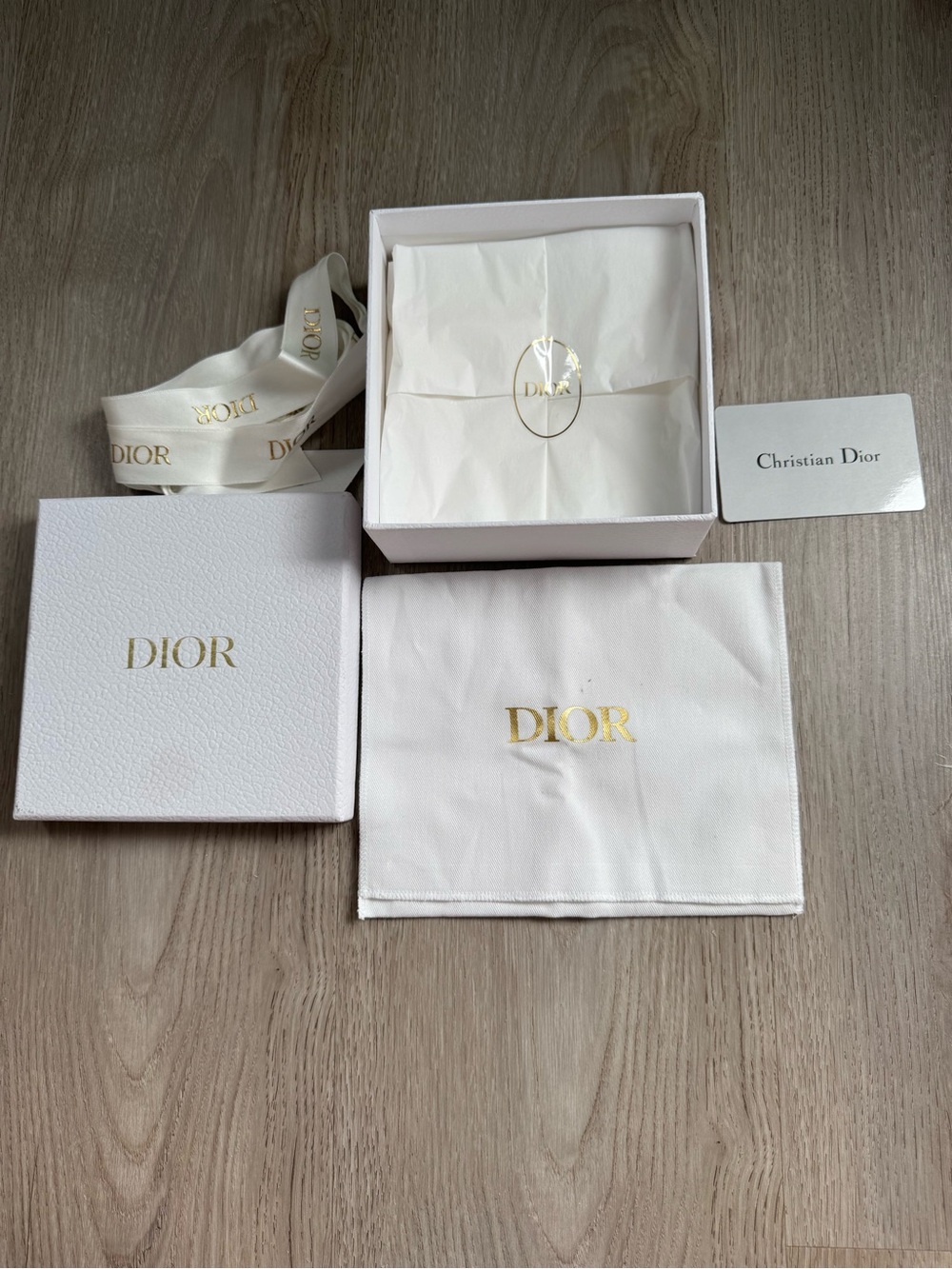 Dior White and Gold Branded Packaging Ensemble